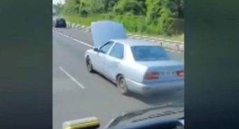 Milano, guida Lancia K con il cofano aperto in tangenziale – Video
